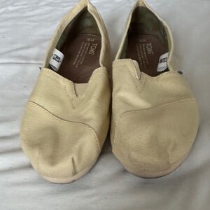 TOMS Classic Tan Canvas Slip-Ons